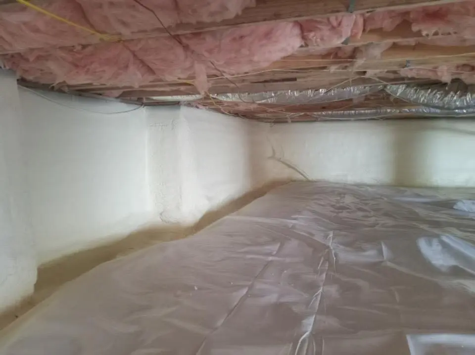 Crawl space encapsulation with closed-cell spray foam for Commercial Roof Restoration in Polk